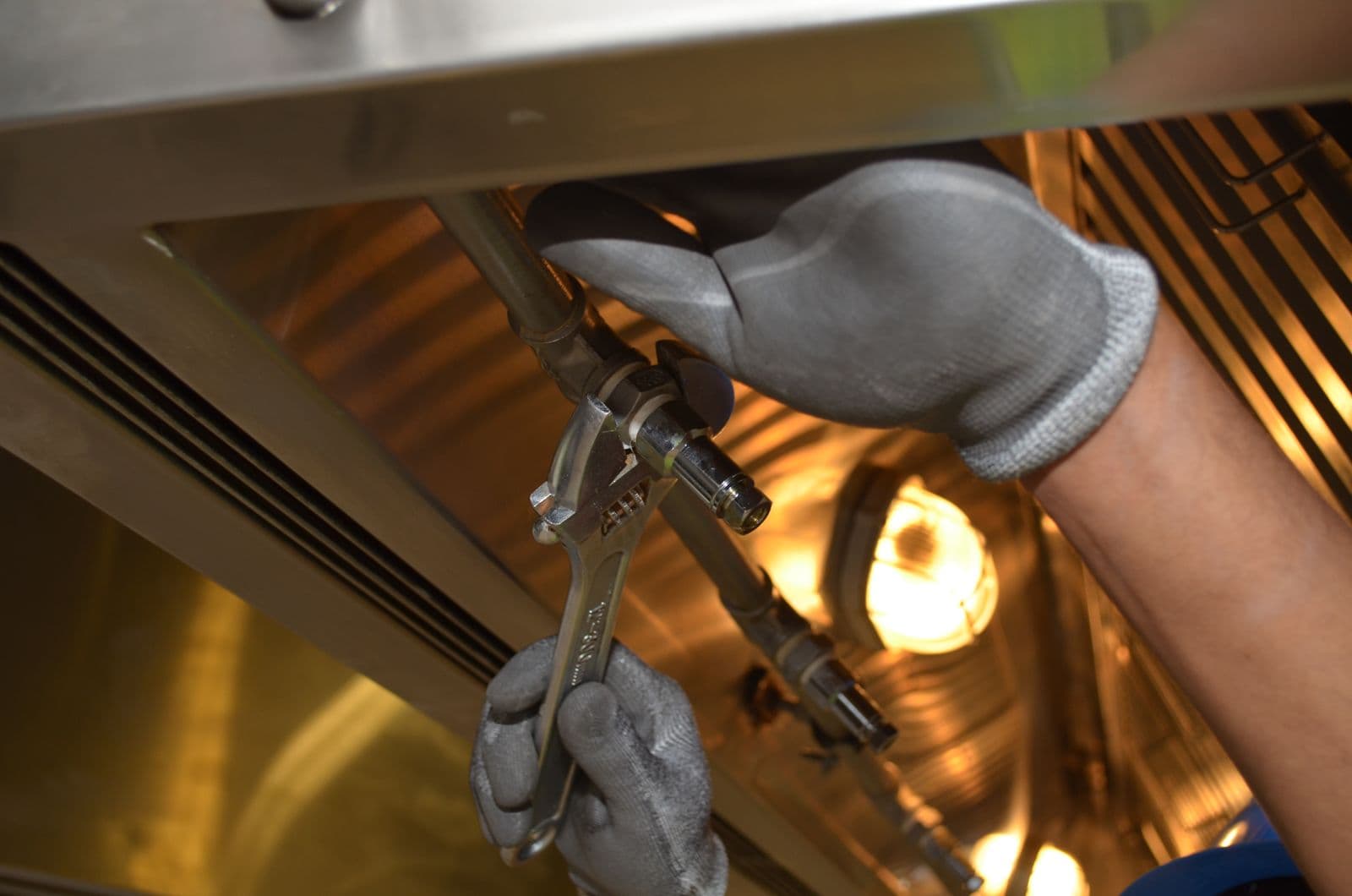 Plumbing tools being used to work on pipework